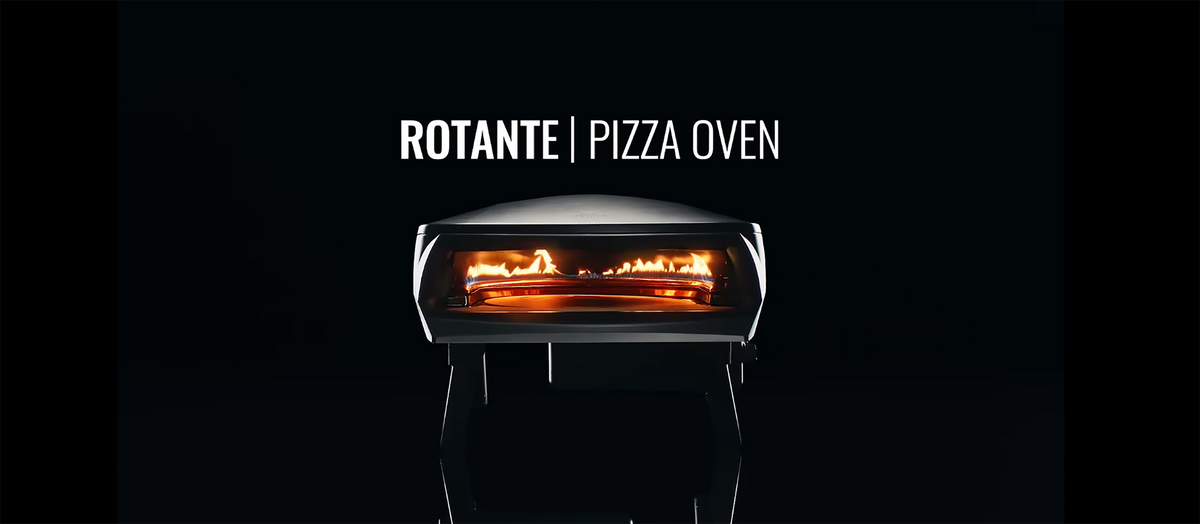 Load video: Witt ETNA Rotante pizza oven in use, showing the rotating pizza stone and cooking process.